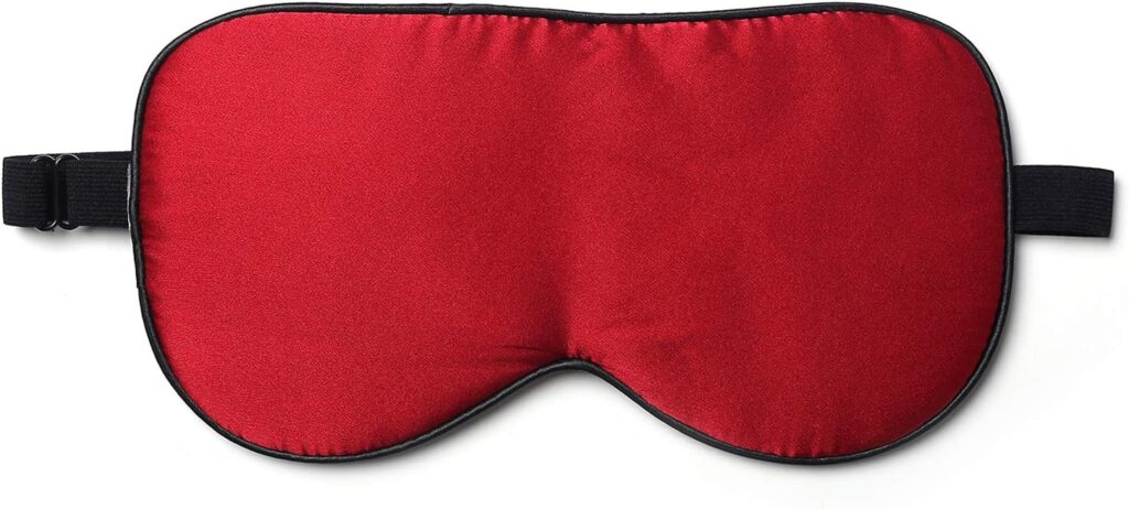 ZIMASILK Seide Schlafbrille in hellblau auf Kopfkissen